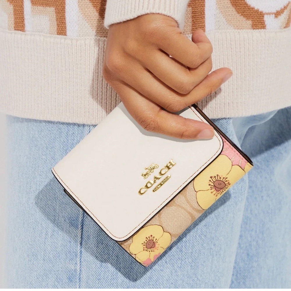Coach Small Trifold Wallet In Signature Canvas With Floral Cluster Print